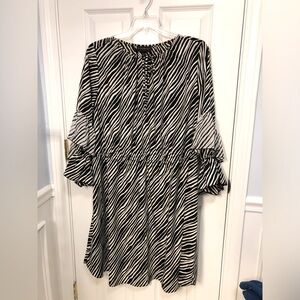 Lane Bryant 18/20 W knee length dress. Black/white print. Cinched waist.